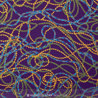 Celebrations - Purple Mardi Gras Beads Metallic Yardage