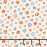 Dogs - Tossed Dogs Paw Prints Tan Yardage Primary Image